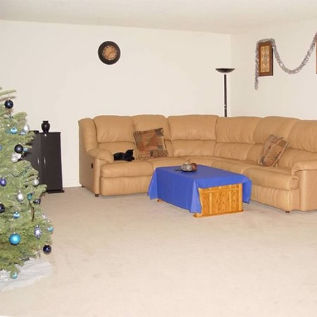 Corner Sofa and Wall Clock