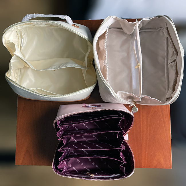 Charlotte Tilbury,Telena and EACHY Makeup Bags open